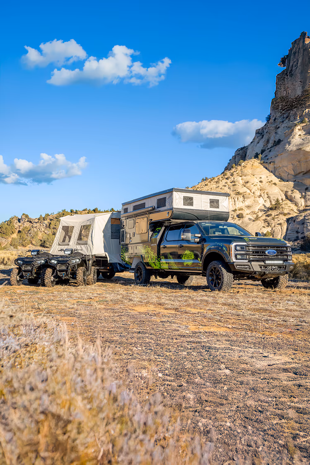 Ford F-250 with a custom camper, two ATVs and a trailer, plus $30,000