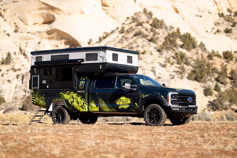 Ford F-250 with a custom camper, two ATVs and a trailer, plus $30,000